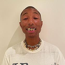 Click image for larger version

Name:	pharrell_new_grills.jpg
Views:	0
Size:	110.6 KB
ID:	1812229