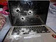 Click image for larger version

Name:	Gunned-apart-MacBook-image-002--580x435.jpg
Views:	0
Size:	75.5 KB
ID:	927709