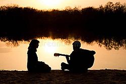 Click image for larger version

Name:	silhouette-young-boy-girl-beach-guitar-57060120.jpg
Views:	0
Size:	22.3 KB
ID:	1771461